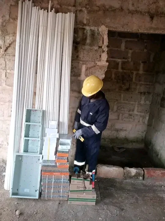 Technician with Materials